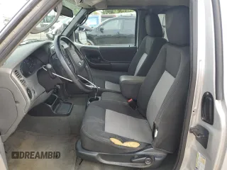 2010 Ford Ranger XLT with VIN 1FTKR4EE6APA01141, listed as a Copart auction lot 54953855 with 130,607 mi miles and Salvage title. Bid and sale history available at DreamBid. Image 7.