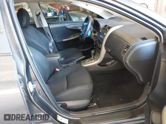 2010 Toyota Corolla with VIN 1NXBU4EE2AZ199308, listed as a IAAI auction lot 42105682 with 206,800 mi miles and . Bid and sale history available at DreamBid. Image 5.
