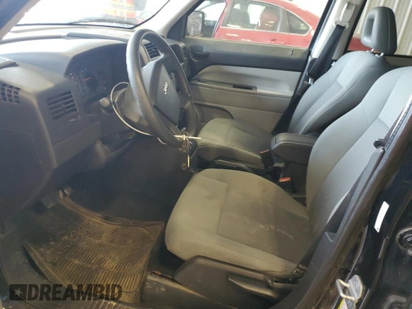 2007 Jeep Patriot Sport with VIN 1J8FF28W67D345719, listed as a Copart auction lot 42592055 with 118,277 mi miles and Salvage Title. Bid and sale history available at DreamBid. Image 7.