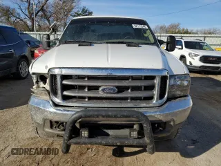 2003 Ford Super Duty F-250 XL with VIN 1FTNX20SX3EB23150, listed as a Copart auction lot 82115544 with 173,624 mi miles and Salvage Title. Bid and sale history available at carsss.com. Image 5.