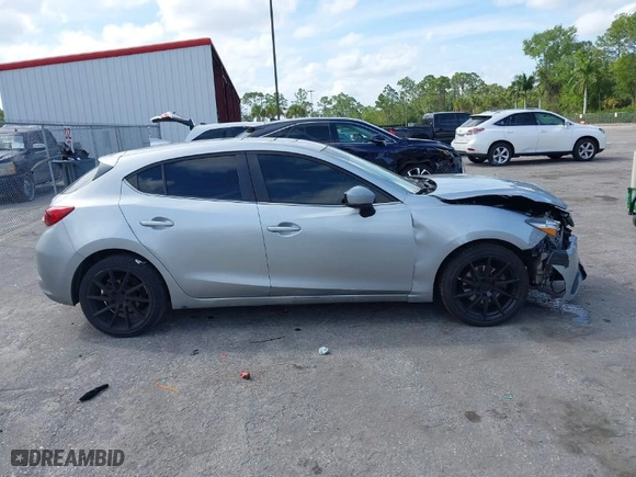 2018 Mazda Mazda3 5-Door Touring with VIN 3MZBN1L35JM194266, listed as a IAAI auction lot 41649431 with 83,122 mi miles. Bid and sale history available at carsss.com. Image 13.