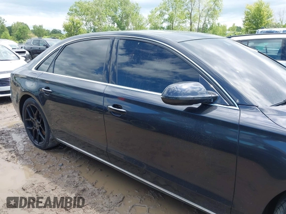 2011 Audi A8 с VIN WAURVAFDXBN020316, выставлен на аукционе IAAI как лот 42297622 с пробегом 156 881 миль миль и . История ставок и продаж доступна на DreamBid. Изображение 13.
