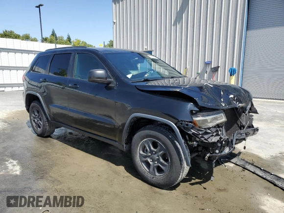 2017 Jeep Grand Cherokee Laredo with VIN 1C4RJEAG1HC813810, listed as a Copart auction lot 59703545 with 57,180 mi miles and Clean title. Bid and sale history available at DreamBid. Image 4.