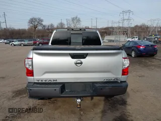 2017 Nissan Titan SL z VIN 1N6AA1E58HN506456, wystawiony jako IAAI lot #41521294 z przebiegiem 59 252 mil mil oraz . Historia ofert i sprzedaży dostępna na DreamBid. Obrazek 16.