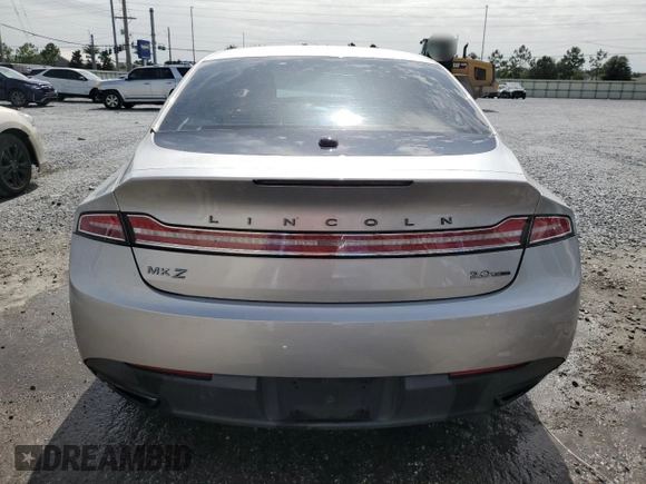 2014 Lincoln MKZ z VIN 3LN6L2G91ER831043, wystawiony jako Copart lot #63109715 z przebiegiem Nie podano mil oraz Szkoda całkowita • Salvage title. Historia ofert i sprzedaży dostępna na DreamBid. Obrazek 6.