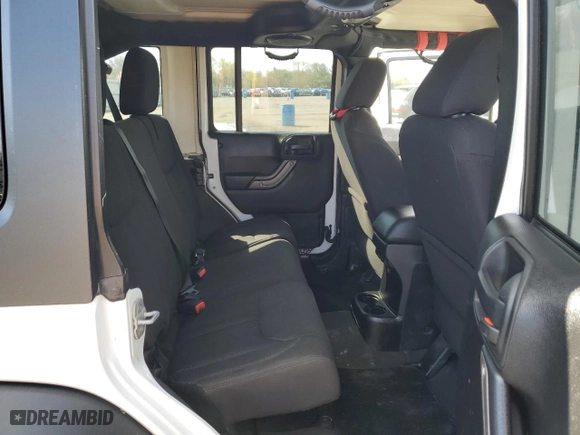 2013 Jeep Wrangler Unlimited Sport with VIN 1C4BJWDG5DL694642, listed as a Copart auction lot 52444395 with 92,559 mi miles and Clean Title. Bid and sale history available at carsss.com. Image 11.
