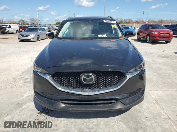 2018 Mazda CX-5 Touring with VIN JM3KFACM0J1408075, listed as a Copart auction lot 50866735 with Not Provided miles and Salvage Title. Bid and sale history available at carsss.com. Image 5.