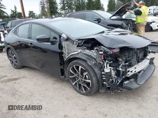 2024 Toyota Prius SE z VIN JTDACACUXR3019263, wystawiony jako IAAI lot #41911062 z przebiegiem 24 988 mil mil oraz . Historia ofert i sprzedaży dostępna na DreamBid. Obrazek 1.