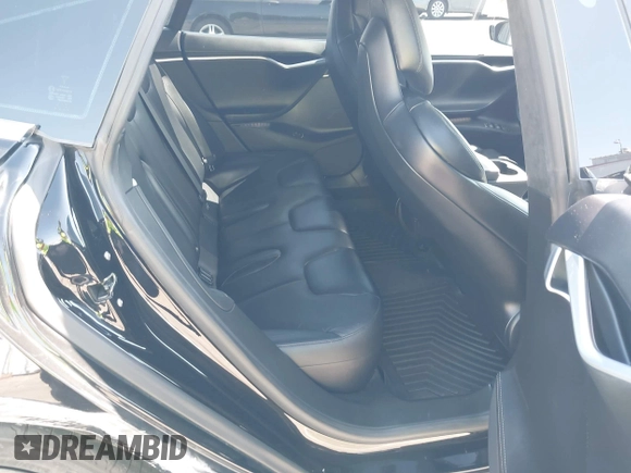 2017 Tesla Model S 100D with VIN 5YJSA1E21HF202591, listed as a IAAI auction lot 41983073 with 140,282 mi miles and . Bid and sale history available at DreamBid. Image 8.