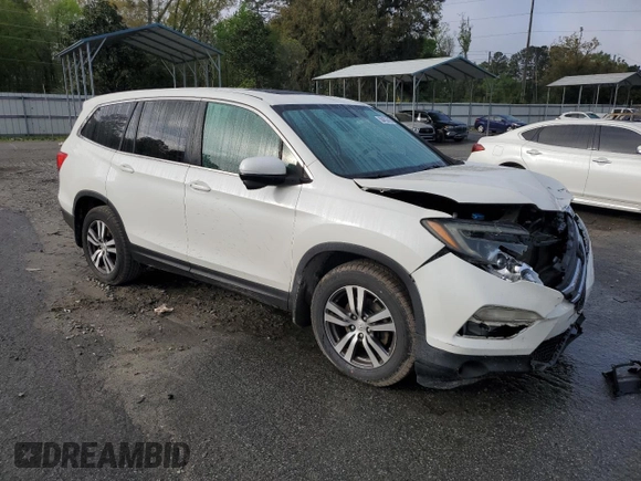 2016 Honda Pilot EX-L with VIN 5FNYF5H71GB034413, listed as a Copart auction lot 50452695 with 118,907 mi miles and Salvage Title. Bid and sale history available at DreamBid. Image 4.