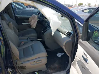2015 Honda Odyssey EX-L with VIN 5FNRL5H6XFB123366, listed as a IAAI auction lot 42037807 with 141,135 mi miles and . Bid and sale history available at DreamBid. Image 5.