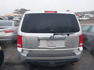 2013 Honda Pilot EX-L with VIN 5FNYF3H75DB012205, listed as a IAAI auction lot 41797084 with 181,577 mi miles and . Bid and sale history available at DreamBid. Image 16.