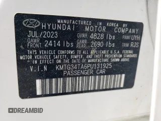 2023 Genesis G70 2.0T z VIN KMTG34TA6PU131925, wystawiony jako Copart lot #52611895 z przebiegiem 30 474 mil mil oraz Szkody całkowita. Historia ofert i sprzedaży dostępna na DreamBid. Obrazek 14.