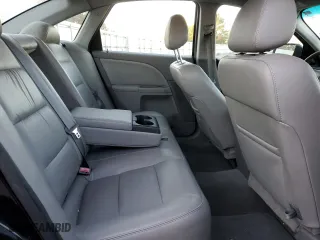 2006 Ford Five Hundred SEL with VIN 1FAFP27136G174716, listed as a Copart auction lot 76389154 with 143,161 mi miles and Salvage Title. Bid and sale history available at carsss.com. Image 10.