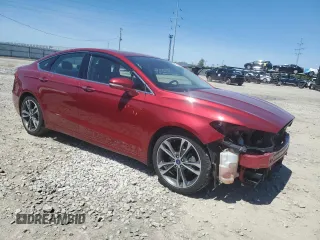 2019 Ford Fusion Titanium with VIN 3FA6P0D91KR205463, listed as a Copart auction lot 54764795 with 105,719 mi miles and Salvage title. Bid and sale history available at DreamBid. Image 4.