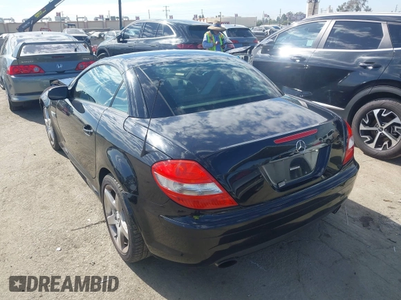 2005 Mercedes-Benz SLK-Class with VIN WDBWK56F85F066196, listed as a IAAI auction lot 41692697 with 197,941 mi miles. Bid and sale history available at carsss.com. Image 3.