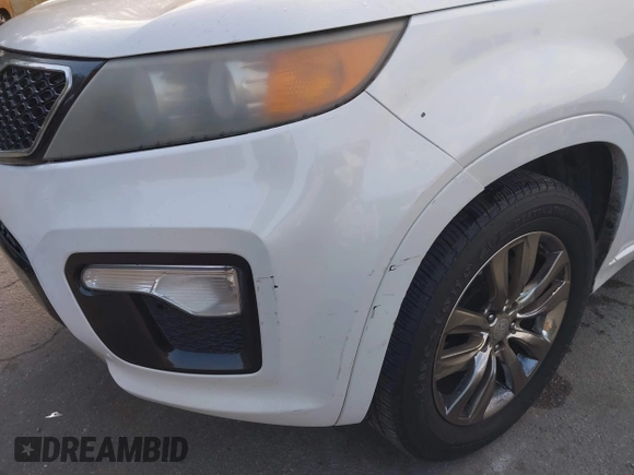 2012 Kia Sorento SX with VIN 5XYKW4A29CG224803, listed as a IAAI auction lot 41493527 with 228,065 mi miles. Bid and sale history available at carsss.com. Image 6.