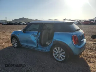 2015 MINI Hardtop 4 Door with VIN WMWXS5C54FT827341, listed as a Copart auction lot 63872395 with 83,023 mi miles and Salvage title. Bid and sale history available at DreamBid. Image 2.
