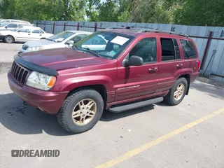 1999 Jeep Grand Cherokee Limited with VIN 1J4GW68S9XC653855, listed as a IAAI auction lot 42433370 with 275,724 mi miles and . Bid and sale history available at DreamBid. Image 2.