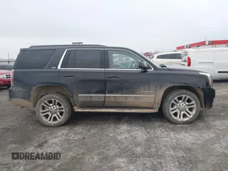 2016 GMC Yukon SLT with VIN 1GKS1BKC9GR480199, listed as a IAAI auction lot 41352032 with 146,716 mi miles. Bid and sale history available at carsss.com. Image 13.
