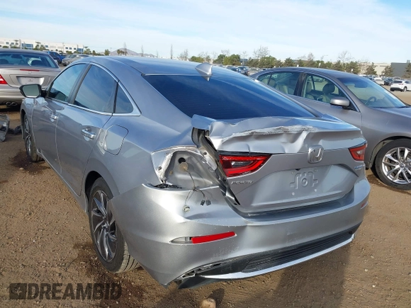 2021 Honda Insight Touring with VIN 19XZE4F99ME009749, listed as a IAAI auction lot 41411868 with 54,808 mi miles and . Bid and sale history available at carsss.com. Image 6.