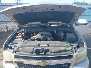 2007 Chevrolet Suburban LS with VIN 1GNFC16007J203853, listed as a IAAI auction lot 39454050 with 246,521 mi miles and . Bid and sale history available at DreamBid. Image 10.
