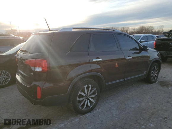 2015 Kia Sorento LX с VIN 5XYKTCA63FG585261, выставлен на аукционе Copart как лот 84011454 с пробегом 148 135 миль миль и Списание • Salvage title. История ставок и продаж доступна на DreamBid. Изображение 3.