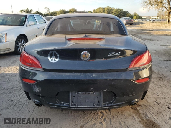 2011 BMW Z4 sDrive35is with VIN WBALM1C56BE633331, listed as a Copart auction lot 73922324 with Not provided miles and Salvage title. Bid and sale history available at DreamBid. Image 6.