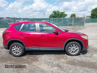 2015 Mazda CX-5 Sport with VIN JM3KE4BY5F0502121, listed as a IAAI auction lot 42652276 with 192,462 mi miles and . Bid and sale history available at DreamBid. Image 13.