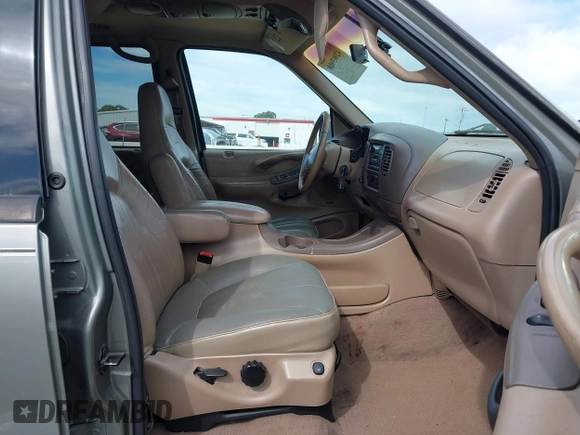 1999 Ford Expedition XLT z VIN 1FMPU18L3XLB21018, wystawiony jako IAAI lot #42003908 z przebiegiem Nie podano mil oraz . Historia ofert i sprzedaży dostępna na DreamBid. Obrazek 5.