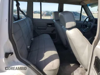 1994 Jeep Cherokee Sport with VIN 1J4FT68S2RL189475, listed as a Copart auction lot 53697465 with 188,210 mi miles and Clean Title. Bid and sale history available at carsss.com. Image 10.
