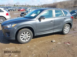 2016 Mazda CX-5 Sport with VIN JM3KE4BY5G0829927, listed as a IAAI auction lot 41678552 with 121,476 mi miles. Bid and sale history available at carsss.com. Image 2.