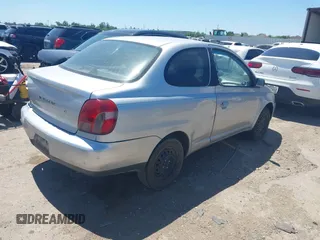 2000 Toyota ECHO z VIN JTDAT1234Y5016760, wystawiony jako IAAI lot #41974124 z przebiegiem 188 323 mil mil oraz . Historia ofert i sprzedaży dostępna na DreamBid. Obrazek 4.