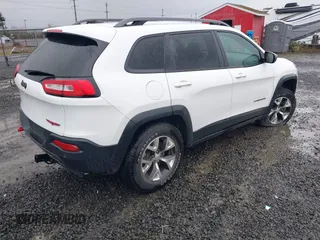 2018 Jeep Cherokee Trailhawk with VIN 1C4PJMBBXJD567022, listed as a IAAI auction lot 41834618 with 41,017 mi miles and . Bid and sale history available at DreamBid. Image 4.