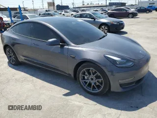 2023 Tesla Model 3 with VIN 5YJ3E1EA8PF616210, listed as a Copart auction lot 49340685 with 38,483 mi miles and Salvage Title. Bid and sale history available at DreamBid. Image 4.