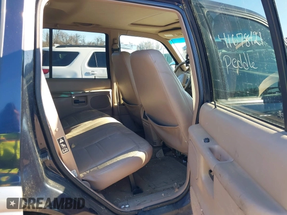 2000 Ford Explorer Eddie Bauer z VIN 1FMDU74E4YZA45773, wystawiony jako IAAI lot #41678121 z przebiegiem 129 263 mil mil oraz . Historia ofert i sprzedaży dostępna na DreamBid. Obrazek 8.