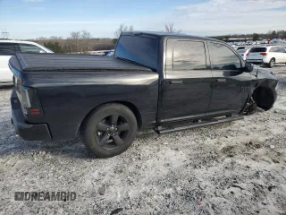 2015 Ram 1500 Express with VIN 3C6RR6KT4FG687339, listed as a Copart auction lot 48102595 with 164,111 mi miles and Salvage title. Bid and sale history available at DreamBid. Image 3.