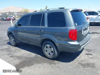 2004 Honda Pilot EX with VIN 2HKYF18514H623272, listed as a IAAI auction lot 42020669 with 186,766 mi miles. Bid and sale history available at carsss.com. Image 3.