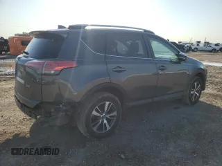2018 Toyota RAV4 XLE with VIN 2T3WFREV0JW517488, listed as a Copart auction lot 51000975 with 68,105 mi miles and Salvage title. Bid and sale history available at DreamBid. Image 3.