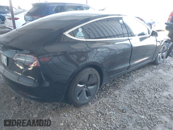 2019 Tesla Model 3 Mid Range with VIN 5YJ3E1EA4KF399151, listed as a IAAI auction lot 41840425 with Not Provided miles and . Bid and sale history available at DreamBid. Image 4.