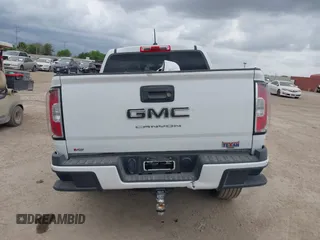 2022 GMC Canyon 4WD Elevation z VIN 1GTG6CEN8N1246041, wystawiony jako IAAI lot #41894487 z przebiegiem 100 966 mil mil oraz . Historia ofert i sprzedaży dostępna na DreamBid. Obrazek 16.