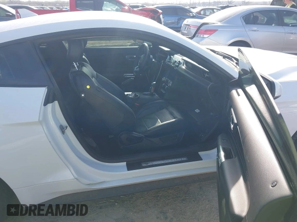 2021 Ford Mustang EcoBoost z VIN 1FA6P8TD5M5133239, wystawiony jako IAAI lot #41899042 z przebiegiem 65 553 mil mil oraz . Historia ofert i sprzedaży dostępna na DreamBid. Obrazek 5.