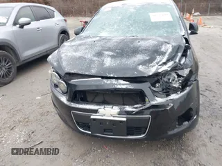 2014 Chevrolet Sonic LS with VIN 1G1JA6SH6E4139131, listed as a IAAI auction lot 41727625 with 97,241 mi miles and . Bid and sale history available at DreamBid. Image 6.