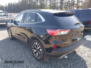 2020 Ford Escape Titanium Hybrid z VIN 1FMCU9DZ9LUC35844, wystawiony jako IAAI lot #42058275 z przebiegiem 74 205 mil mil oraz . Historia ofert i sprzedaży dostępna na DreamBid. Obrazek 3.