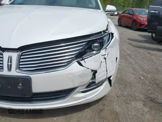 2015 Lincoln MKZ Hybrid with VIN 3LN6L2LU6FR605723, listed as a IAAI auction lot 42246269 with 121,942 mi miles and . Bid and sale history available at DreamBid. Image 13.