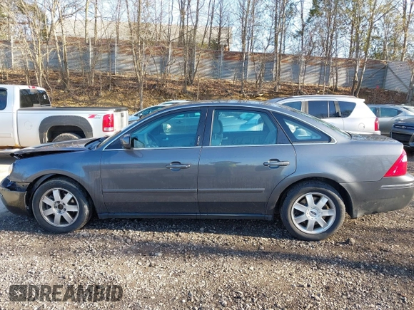 2005 Ford Five Hundred SE z VIN 1FAFP231X5G145153, wystawiony jako IAAI lot #42059747 z przebiegiem 59 114 mil mil oraz . Historia ofert i sprzedaży dostępna na DreamBid. Obrazek 14.
