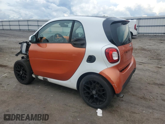2016 Smart fortwo Passion with VIN WMEFJ5DA0GK060576, listed as a Copart auction lot 55641565 with 99,558 mi miles and Salvage title. Bid and sale history available at DreamBid. Image 2.