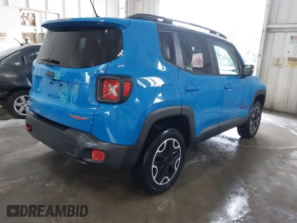 2015 Jeep Renegade Trailhawk with VIN ZACCJBCT0FPB59264, listed as a IAAI auction lot 42203406 with 109,000 mi miles and . Bid and sale history available at DreamBid. Image 4.