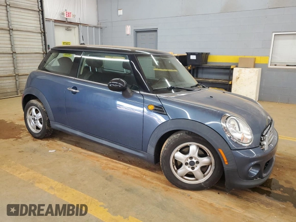 2011 MINI Hardtop with VIN WMWSU3C54BT184251, listed as a Copart auction lot 59298135 with 123,864 mi miles and Salvage title. Bid and sale history available at DreamBid. Image 4.