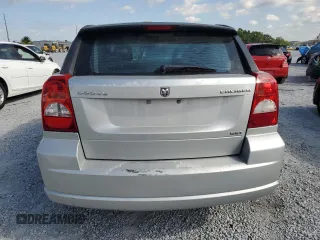 2009 Dodge Caliber SXT with VIN 1B3HB48AX9D157186, listed as a Copart auction lot 52892065 with 218,024 mi miles and Salvage Title. Bid and sale history available at carsss.com. Image 6.